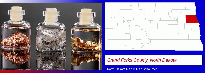 gold, silver, and copper nuggets; Grand Forks County, North Dakota highlighted in red on a map